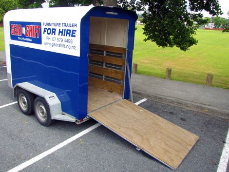 Easy access ramp and side rails for secure loads